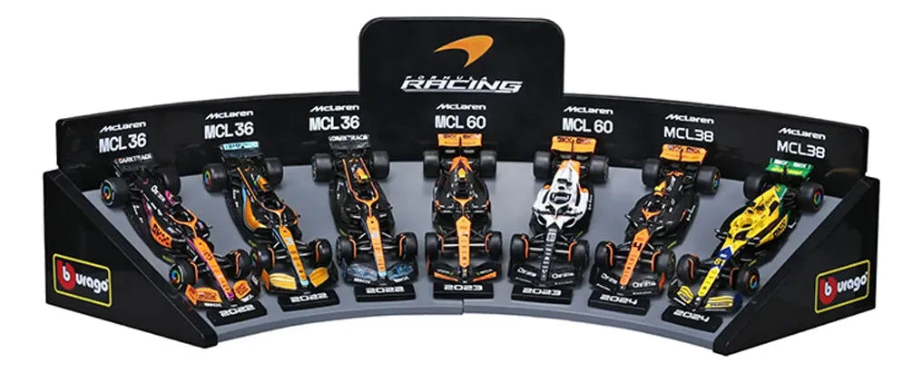 Bburago 1:43 Mclaren Set 7 Autos + Soporte De Exposición Varios